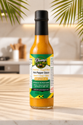Pineapple Mango Hot Pepper Sauce bottle with the new Chinny’s Island Spice label